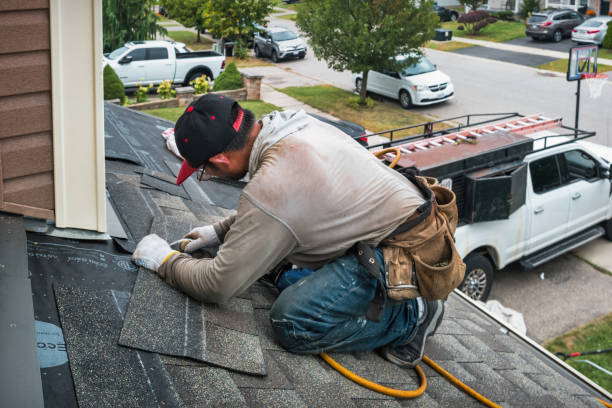 Professional Roofing technician working in Durand, MI